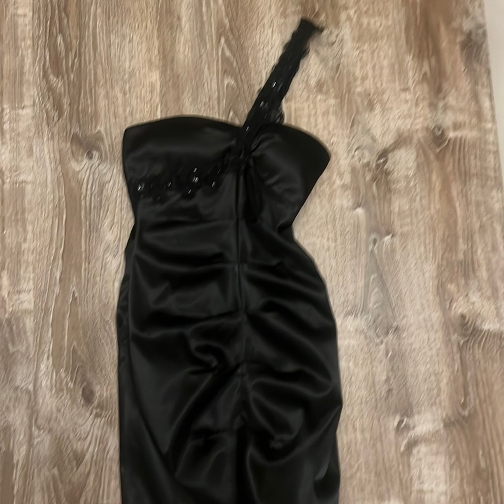 Beautiful black one strap dress. Beautiful detail